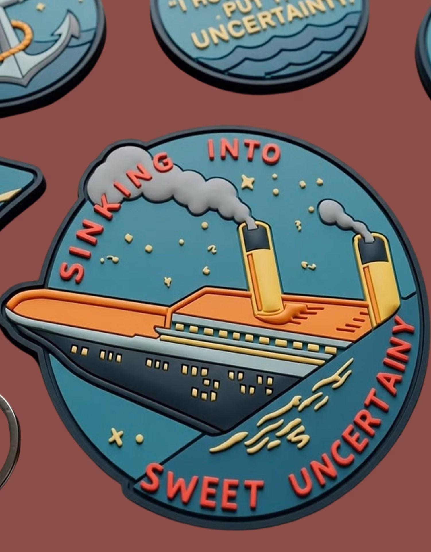 Durable custom PVC patch with a detailed ocean liner design for branding and promotional use.